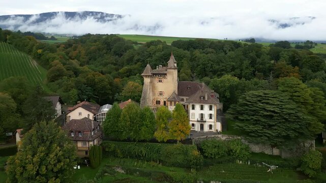 Push in drone shot of Vaumarcus Castle in Canton of Neuchatel Switzerland