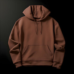 A brown hoodie displayed against a dark background, showcasing its design and style.