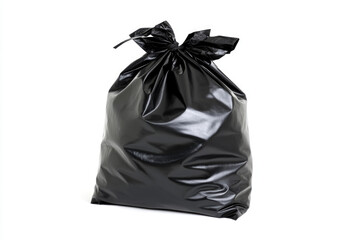 Shiny black plastic garbage bag on white background for waste management concepts