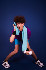 Funny skinny curly guy doing fitness. Retro style.