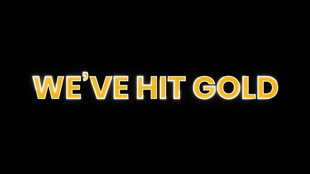 Animated text "We've Hit Gold" in vibrant yellow with white outline. Perfect for celebratory videos and success announcements.