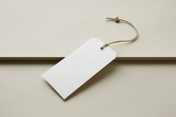 White clothing hang tag mockup blank paper cardboard price label tag with rope with sopy space