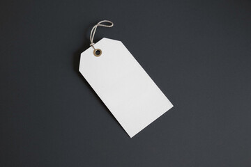 White clothing hang tag mockup blank paper cardboard price label tag with rope with sopy space