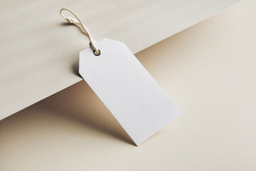 White clothing hang tag mockup blank paper cardboard price label tag with rope with sopy space