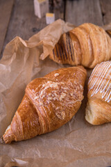 Croissants with different fillings on kraft paper