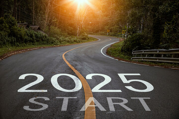 New year 2025, Text start 2025 written on the road in the middle of asphalt road at sunset. Concept...