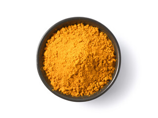 Flat lay Pile of Turmeric powder in black bowl isolated on white background. Clipping path.
