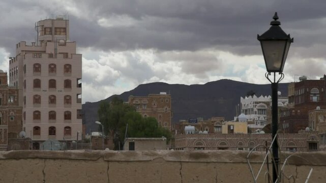 Timelapse of Haddah Area in Yemen, Sana'a clouds moving with Arab style building