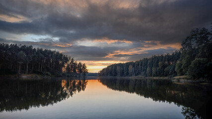 Breathtaking Serene Sunset Reflections Gracefully Dancing Over Calm and Peaceful Waters