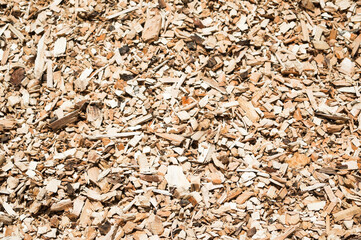 The photo shows a close-up of wood chips