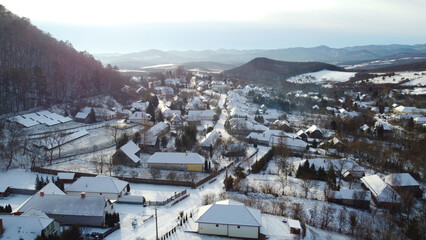 Winter morning in a snow-covered village