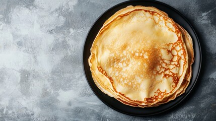A stack of warm, golden crepes rests on a black plate, highlighting their delicate texture and inviting appearance on a gray surface. Generative AI