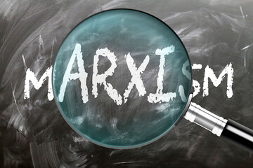 Marxism - learn, study and inspect it. Taking a closer look at marxism. A magnifying glass enlarging word 'marxism' written on a blackboard ,3d illustration © GoodIdeas