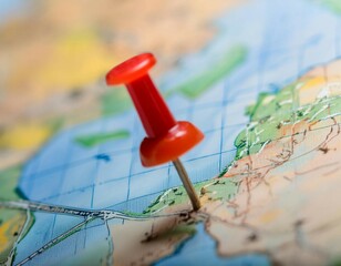 Marker pointing to a specific location on a map, representing geographic positioning and site identification.