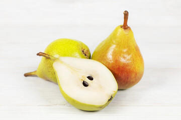 Yellow Pears. Pears on white wooden background. Pears macro studio photo