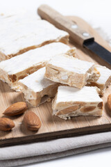 Christmas almond nougat isolated on white background.