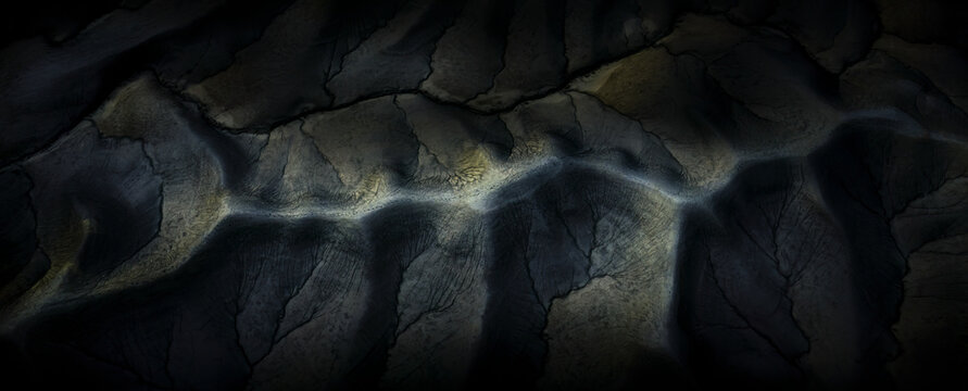 Aerial view of dramatic rugged landscape with unique rock formations and serene valley, Torrey, United States.
