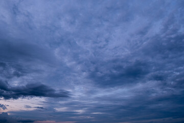 Obraz premium Dark sky with stormy clouds. Dramatic sky rain,Dark clouds before a thunder-storm.