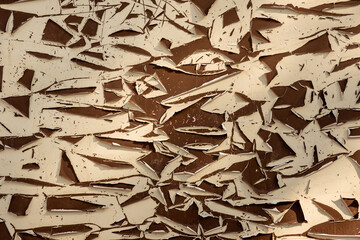The texture of peeling old white paint on a red background. Cracked paint background. A painterly perfect texture to overlay on your photos.