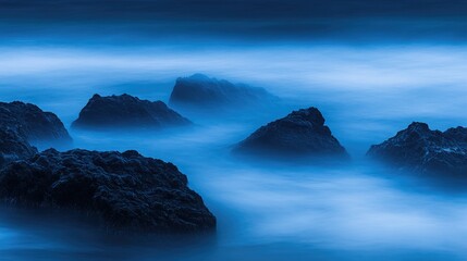 Tranquil Ocean Waves and Rocks in Blue Tones
