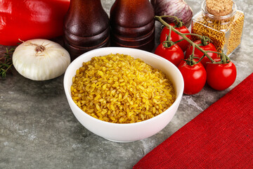 Dry wheat bulgur cereal heap