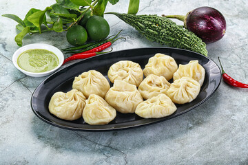 Nepali steamed dumplings  Momo with sause