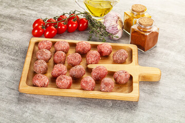Uncooked raw beef meatball minced
