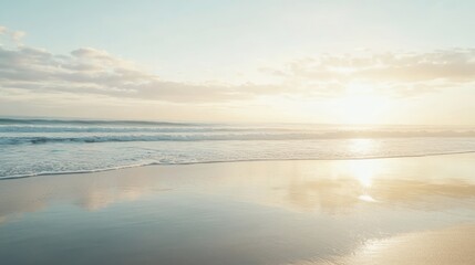 Obraz premium Serene Beach at Sunrise with Gentle Waves