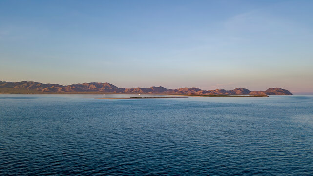 Aerial view of tranquil cortes sea with serene coastline and expansive horizon, Baja California Sur, Mexico.