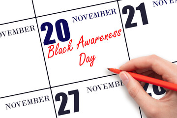 November 20. Hand writing text Black Awareness Day on calendar date. Save the date.