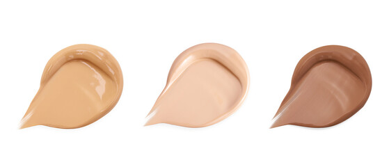 Set liquid foundation smudge on white background. Beauty skincare texture swipe swatch.