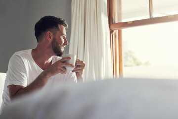 Coffee, tea and bedroom thinking with man, smile and drinking warm beverage in home bed for...