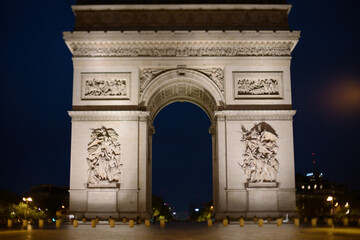 Paris,France - October 6, 2024: Arc de triomphe at rainy dawn in Paris, France