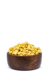 Roasted Garbanzo Bean or Chickpea in a Wooden Bowl Isolated on White Background with Copy Space, Also Known as Bengal Gram or Egyptian Pea in Vertical Orientation