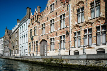 Obraz premium Picture of the beautiful old buildings along Bruges canals, Belgium