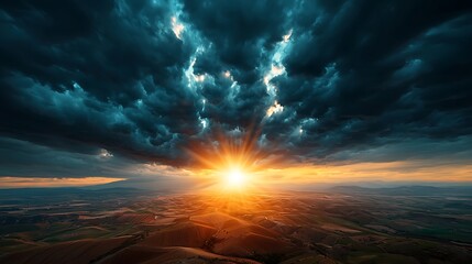 A stunning view of a dramatic sunset illuminating rolling hills, surrounded by dark clouds. The vibrant colors create a breathtaking and serene atmosphere.
