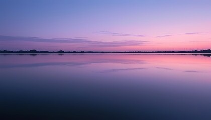 Naklejka premium Serene Lakeside at Twilight with Soft Purple and Pink Reflections on the Water