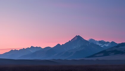 Mountain Range at Twilight with the Sky Gradually Transitioning from Pink to Purple