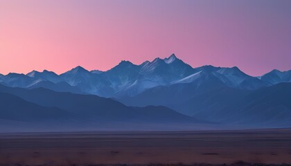 Fototapeta premium Mountain Range at Twilight with the Sky Gradually Transitioning from Pink to Purple