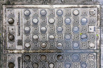 Design of Manhole cover with "DBM DKI JAKARTA" (Dinas Bina Marga Provinsi DKI Jakarta, which means "DKI Jakarta Provincial Highways Department")