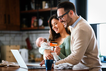 Parents with baby having video call online, conversation with relatives, communicating with friends