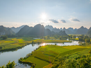 Fototapeta premium Aerial landscape in Phong Nam valley, Cao bang province, Vietnam with river, nature, rice fields, beautiful destination in Northern Vietnam