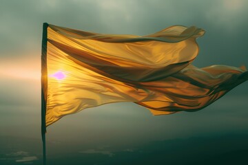 A yellow flag waving in the air on a cloudy day, ideal for use in weather or outdoor-themed projects
