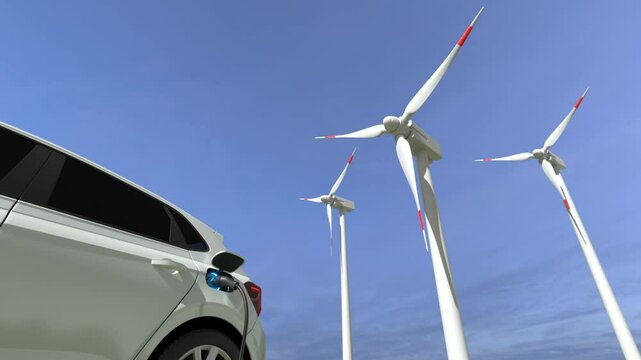 Electric cars Charging at the charging station and with a Wind turbine background, Electric power is an alternative fuel
