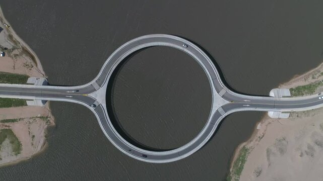 Aerial view of the modern Laguna Garzon Bridge over tranquil waters, Laguna Jose Ignacio, Uruguay.