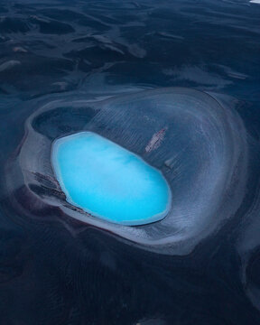 Aerial view of beautiful blue lagoon with unique geological formations, Highlands, Iceland.