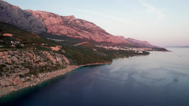 Aerial view of the beautiful coastline with clear turquoise sea and dramatic cliffs, Ramova village, Croatia.