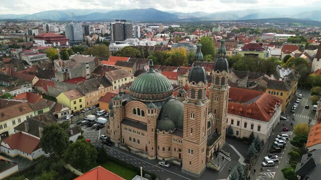 Aerial view of Orthodox Cathedral in Sibiu, Romania. Catedrala Ortodoxă "Sf&acirc;nta Treime". The church has a unique architecture with a large dome and surrounding buildings.