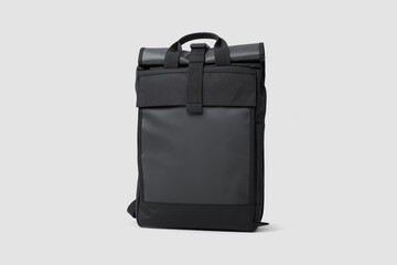 Photo of a black backpack on a white background