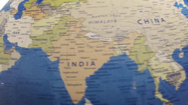 Atlas map of the world globe spinning zooming in and focusing on the country of Egypt, Egyptian, Cairo, Luxor.